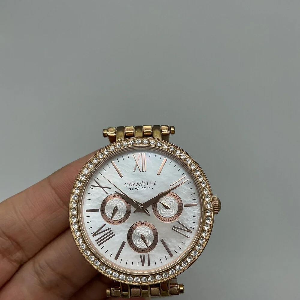 Caravelle New York Womens Watch 38mm MOP Gold Tone Day Date New Battery 5.75